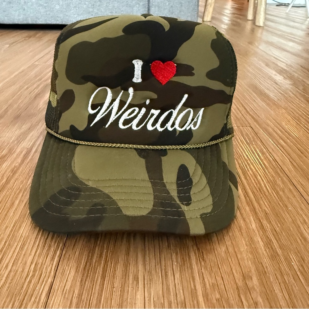Dressed in LALA Camo 'I ❤️ Weirdos' Trucker Hat